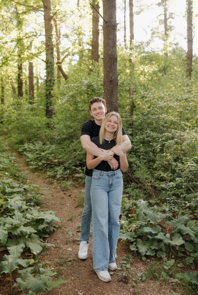 cute picture of the newly engaged couple hugging