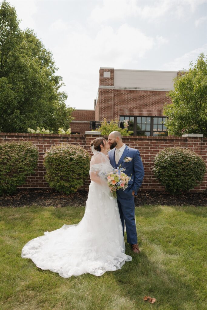 cute picture of the newlyweds kissing