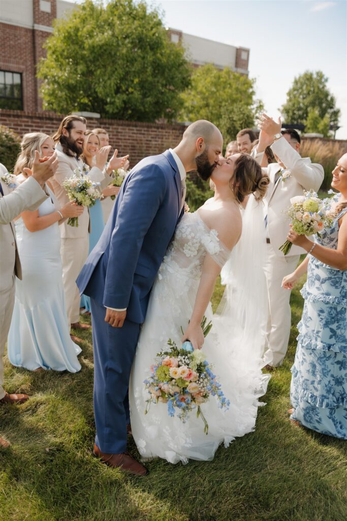 golden hour portrait of the newlyweds and their friends