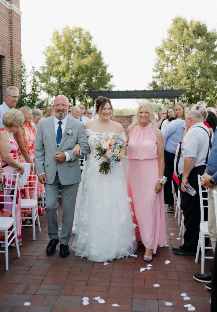 cute picture of the bride walking down the aisle