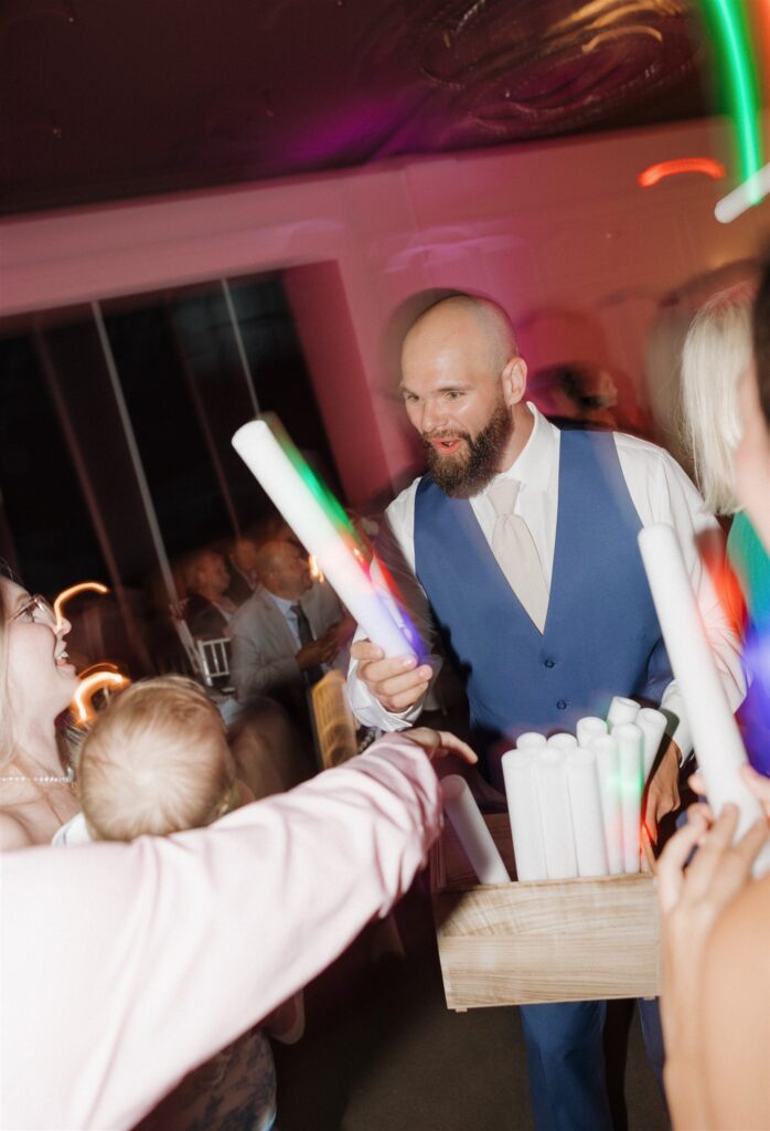 newlyweds at their fun wedding reception party