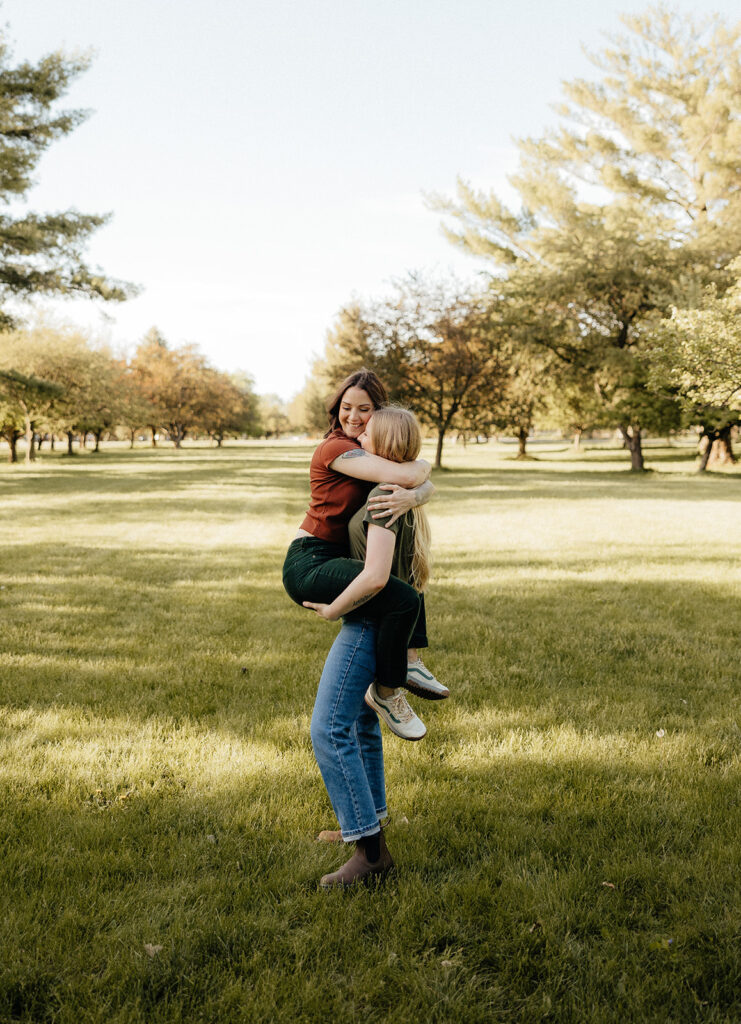 couple at their playful outdoor engagement photos