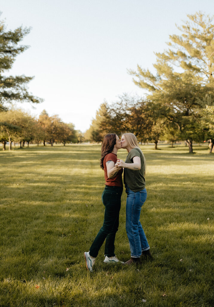 cute portrait of the newly engaged couple kissing