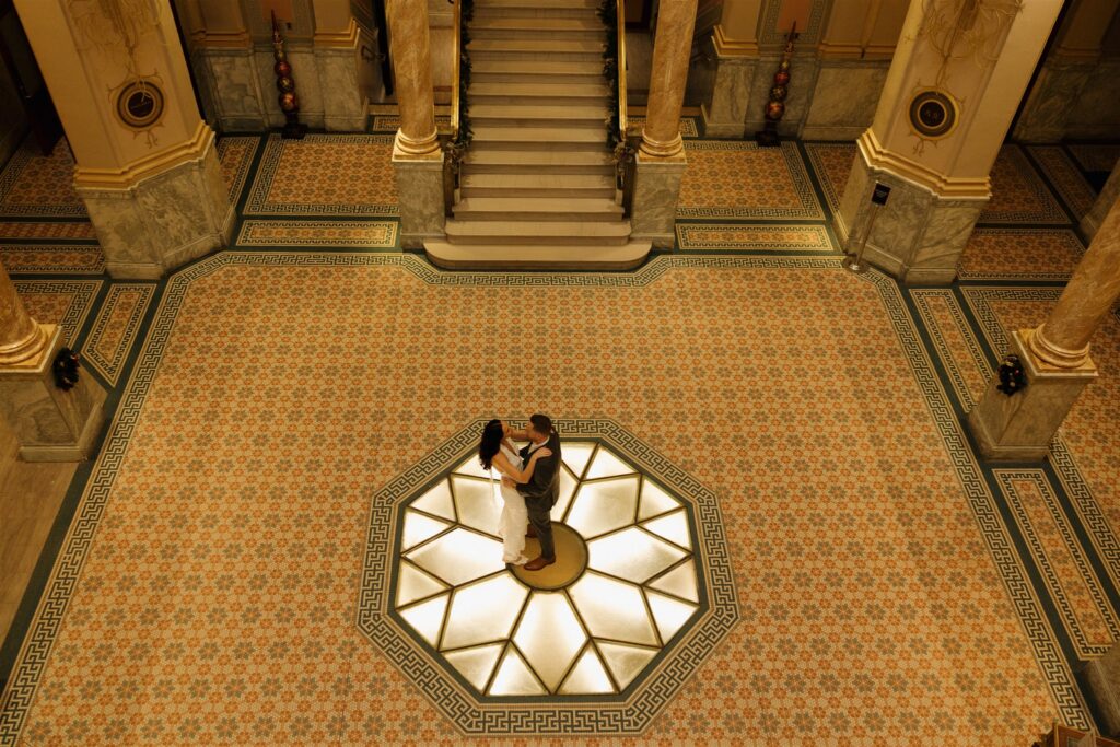 cute picture of the newly engaged couple dancing during their photoshoot