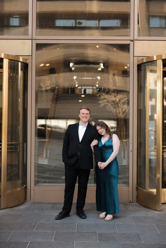 newly engaged couple hugging during their engagement photos