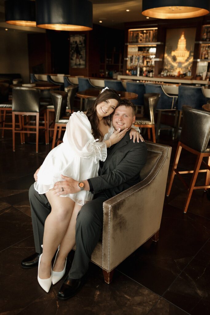 couple smiling at the camera during their photoshoot
