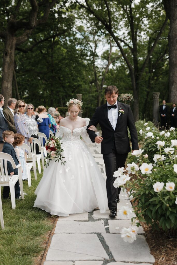 cute picture of the newlyweds heading to their wedding reception