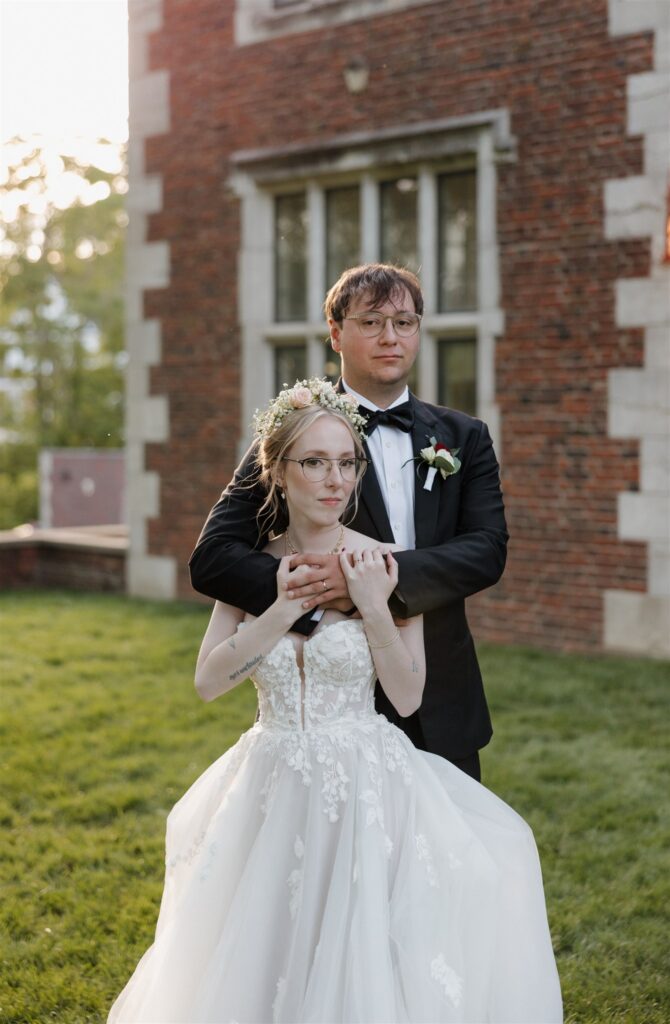 Cute portrait of the newly married couple hugging