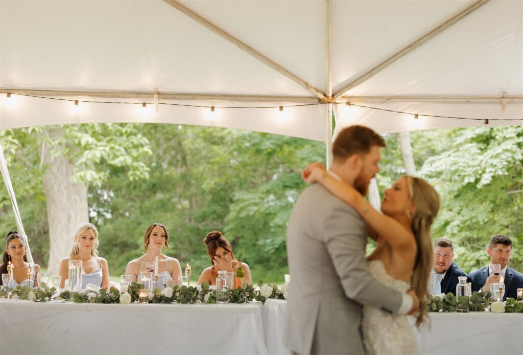 cute picture of the newlyweds smiling at each other