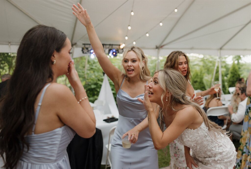 bride having the best time at her dream wedding reception party