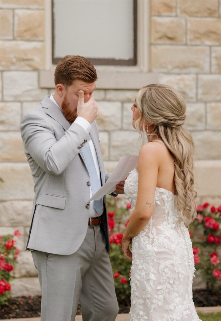 Bride and groom emotional during their vows