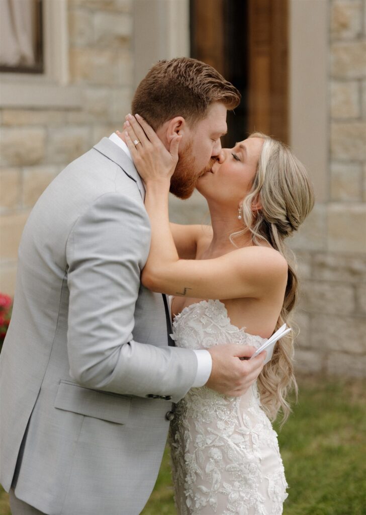Picture of the bride and groom, kissing