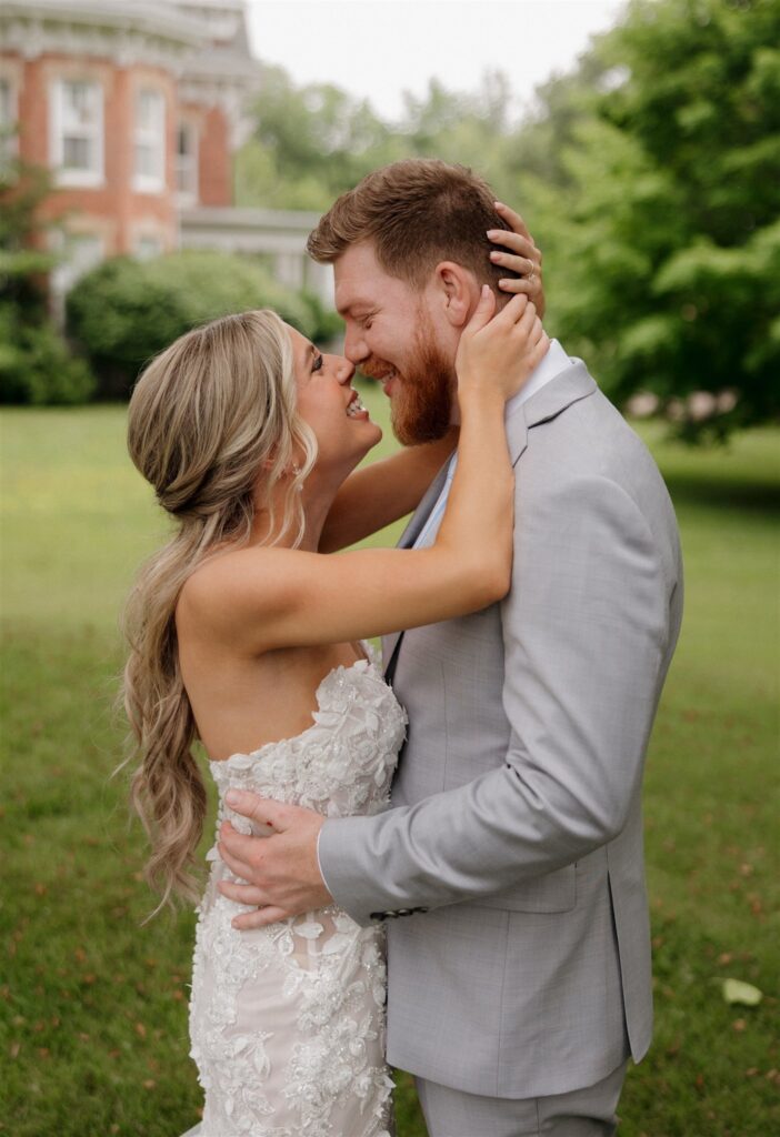 Cute picture of the newly married couple smiling at each other