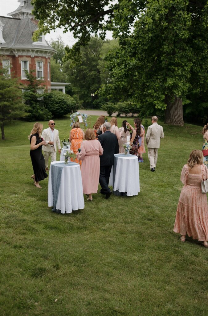 Inside Courtney & Alex’s Elegant Summer Wedding at The Renwick Mansion in Davenport Iowa