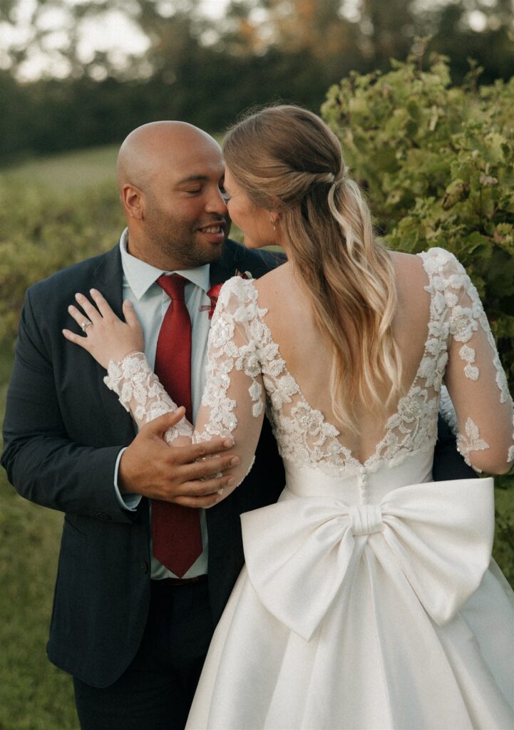 cute picture of the bride and groom smiling at each other