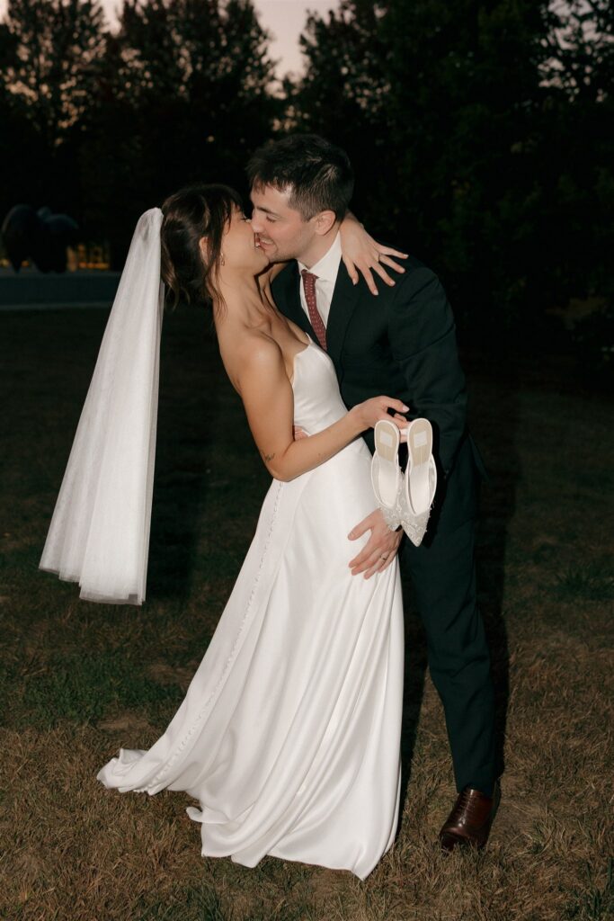 cute picture of the newlyweds kissing