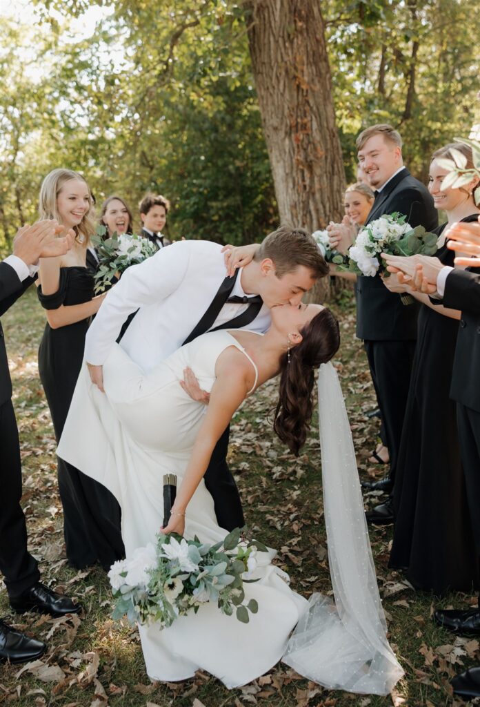 Picture of the bride and groom with their bridal parties