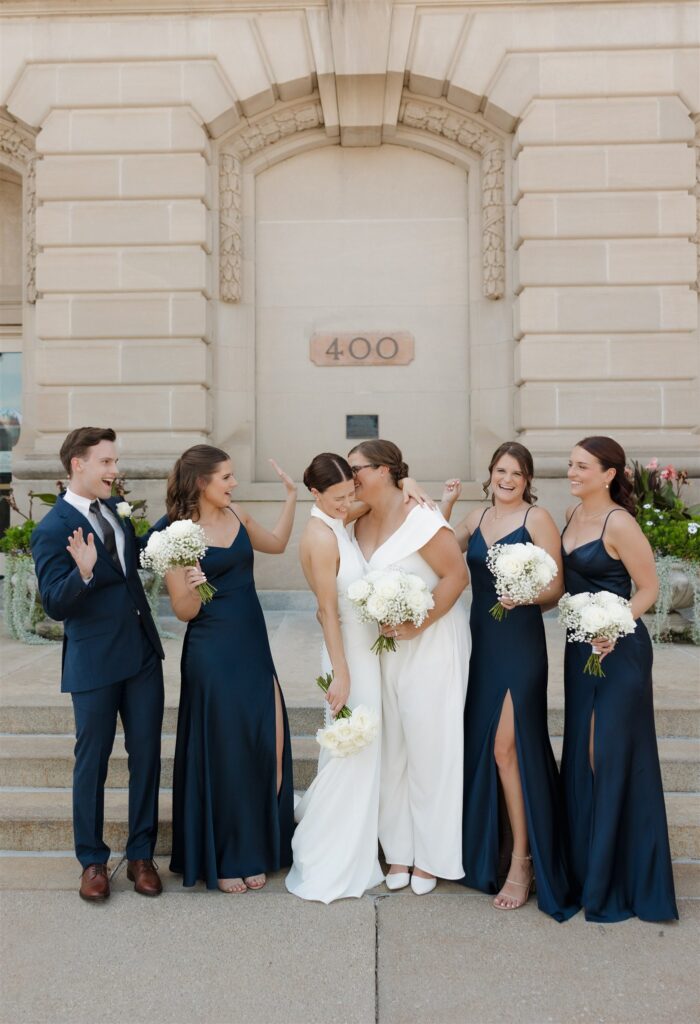 cute picture of the couple and their bridal parties