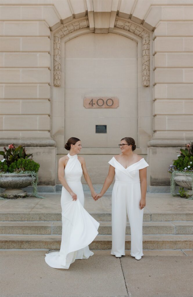 cute picture of the couple smiling at each other during their photoshoot