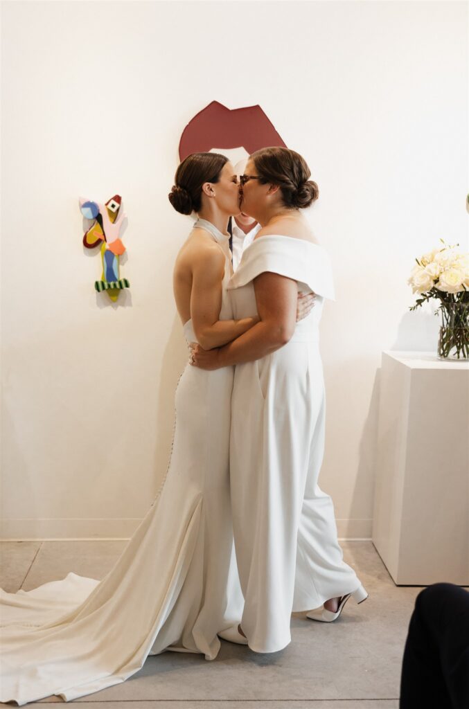cute picture of the newlyweds kissing