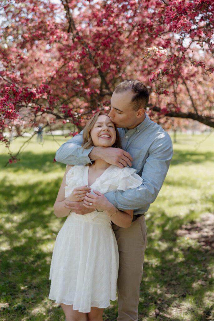 Fun & Romantic Couples Photos in Des Moines During Crabapple Tree Bloom