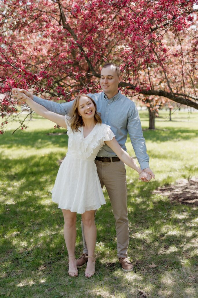 Fun & Romantic Couples Photos in Des Moines During Crabapple Tree Bloom