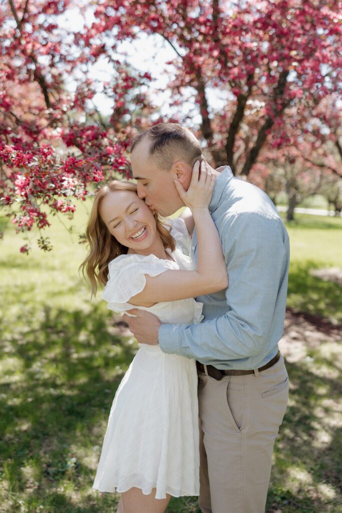 Fun & Romantic Couples Photos in Des Moines During Crabapple Tree Bloom