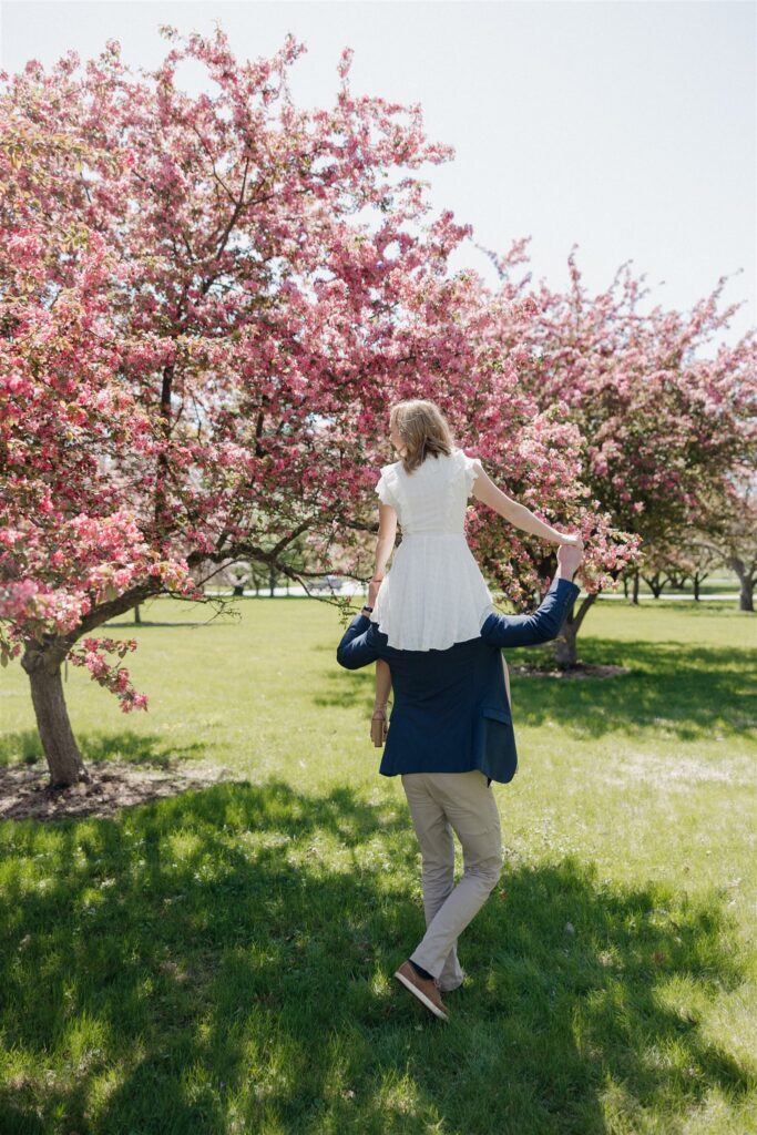 Fun & Romantic Couples Photos in Des Moines During Crabapple Tree Bloom