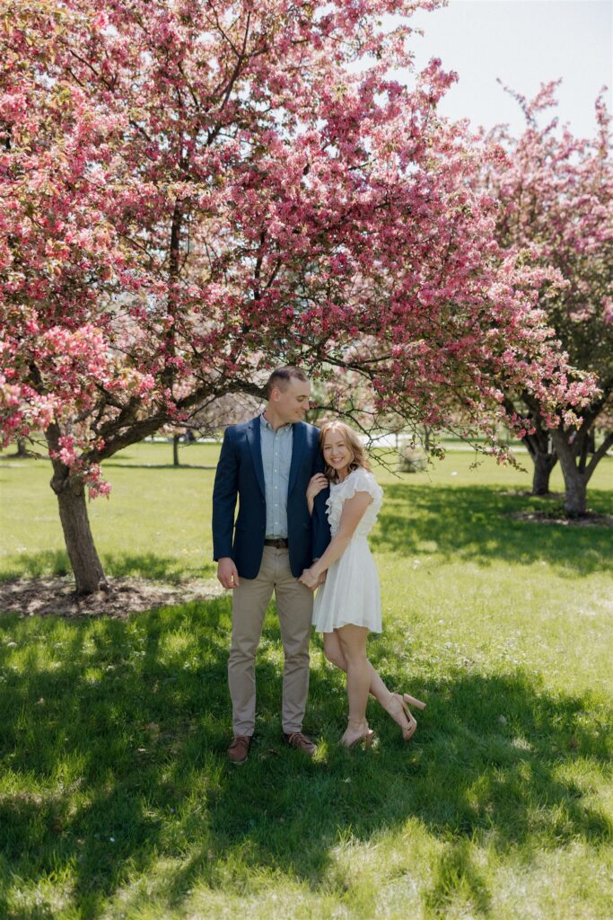 Fun & Romantic Couples Photos in Des Moines During Crabapple Tree Bloom
