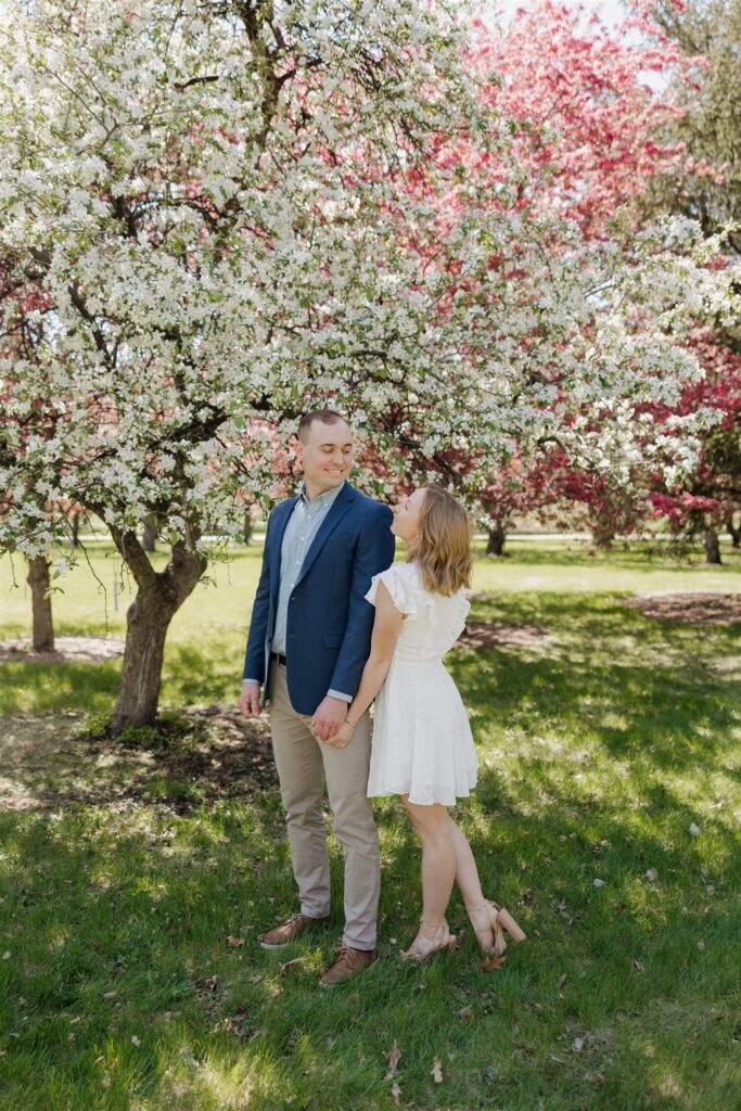 Fun & Romantic Couples Photos in Des Moines During Crabapple Tree Bloom