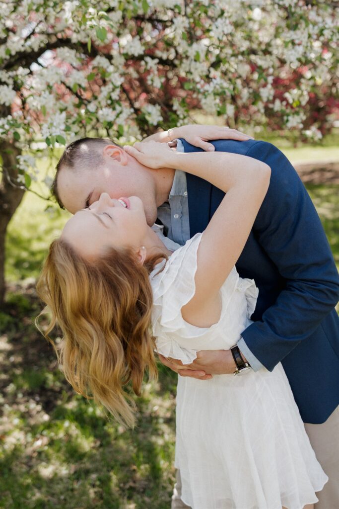 fiance kissing his fiance on the cheek