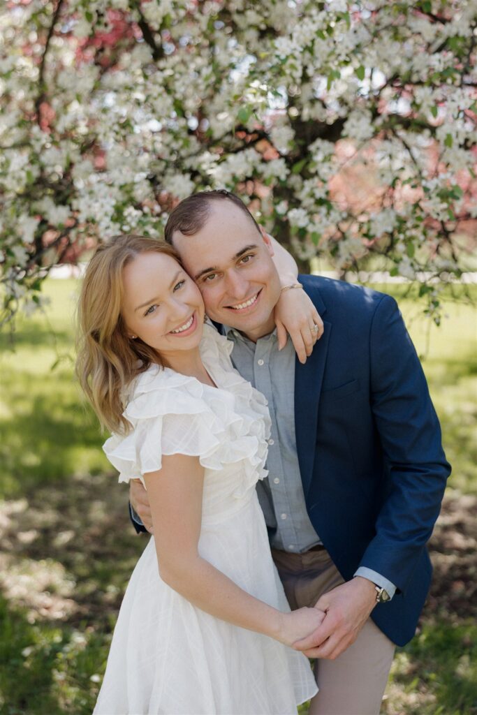 couple smiling at each other during their photoshoot