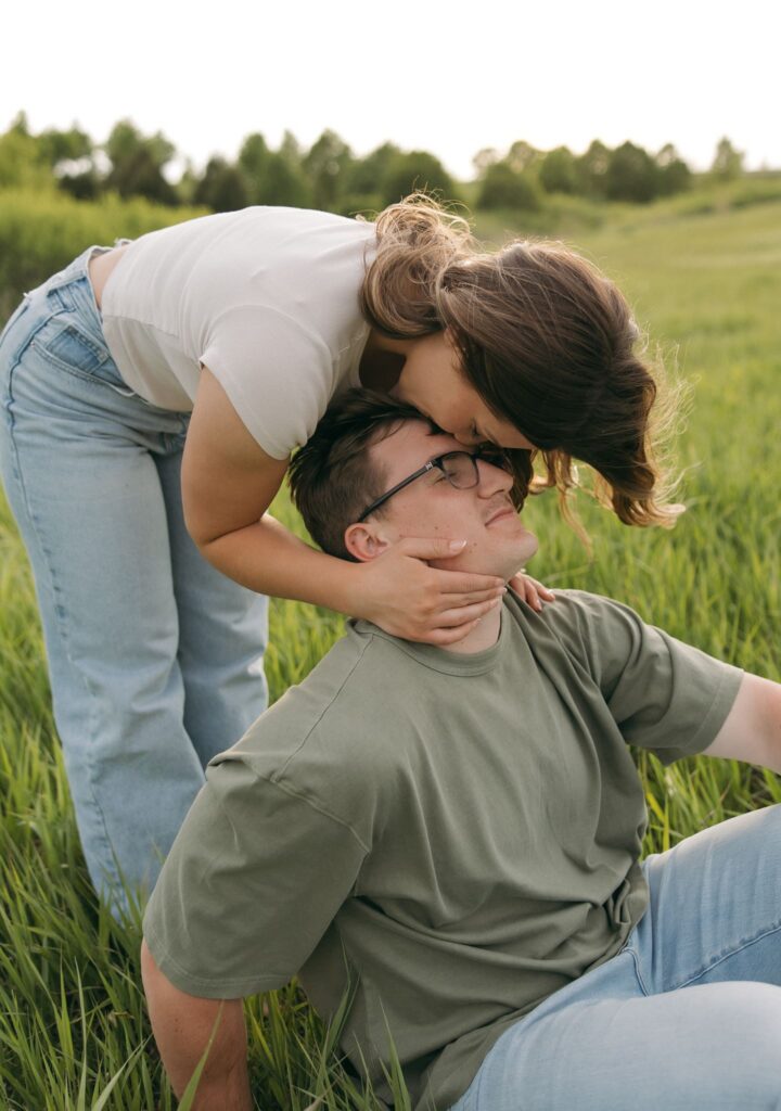fiance kissing her fiance on the cheek
