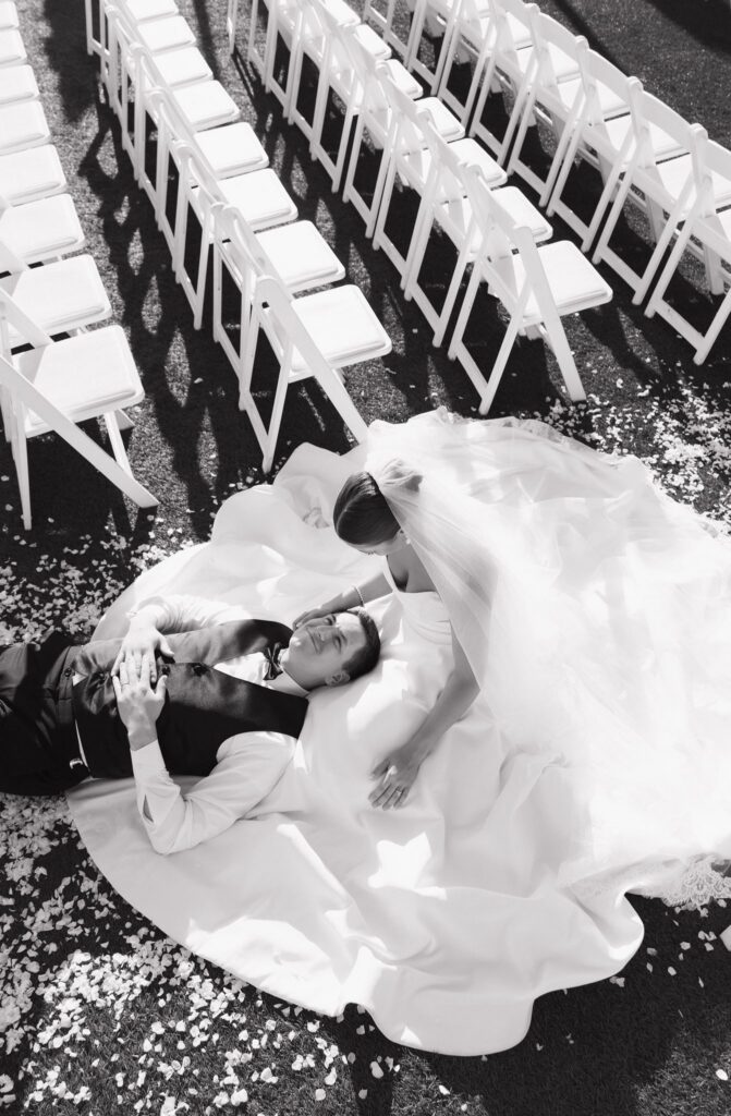 cute picture of the newlyweds smiling at each other