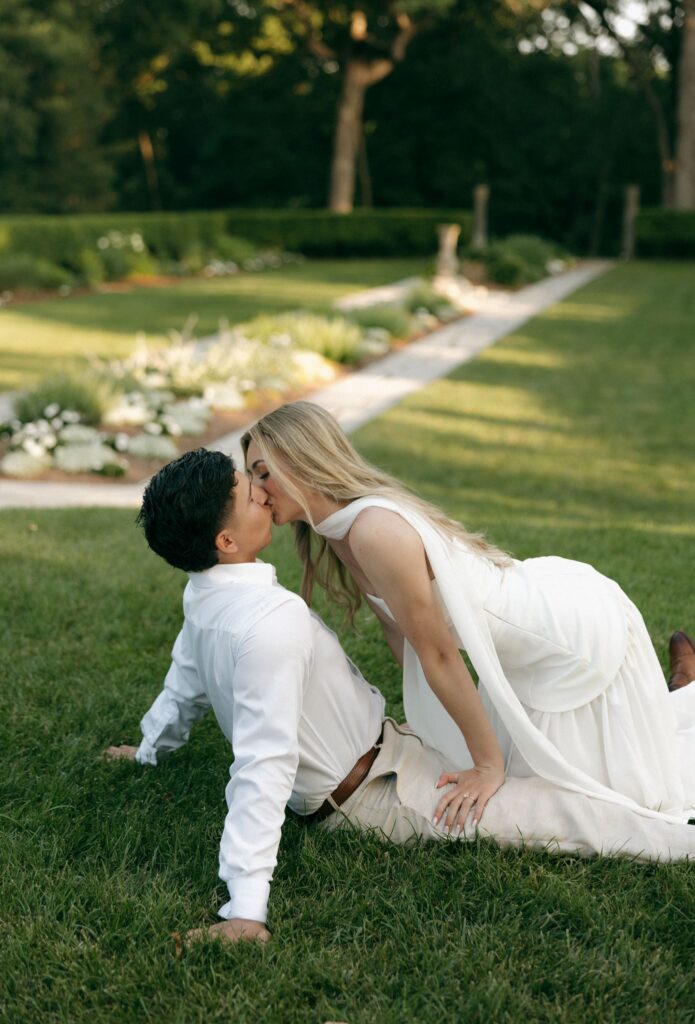 newly engaged couple kissing during their romantic photoshoot