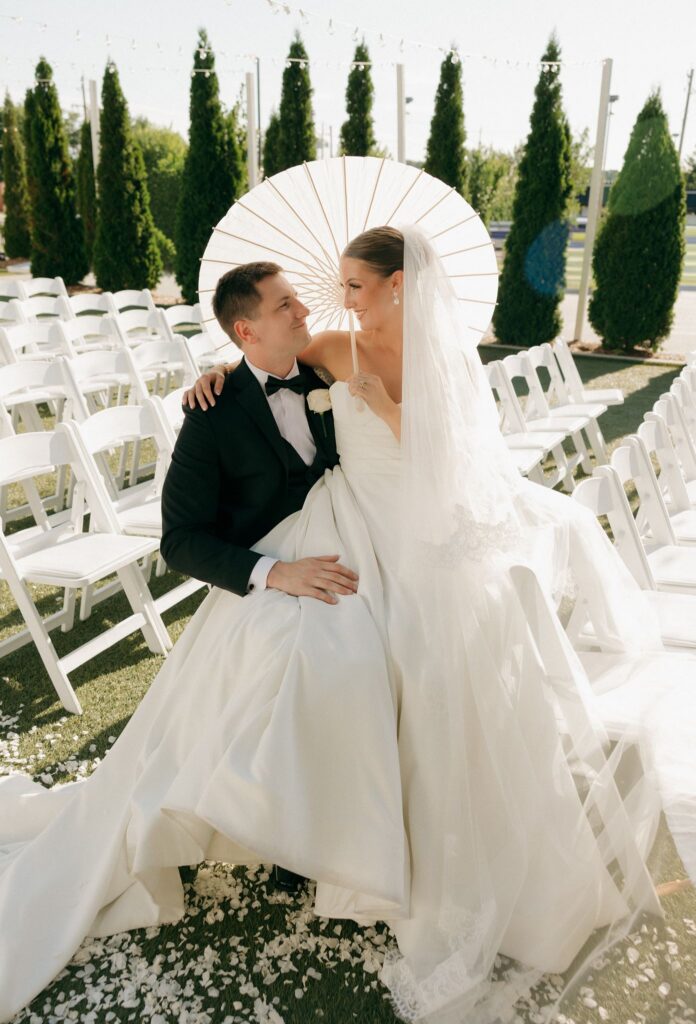 cute picture of the bride and groom smiling at each other