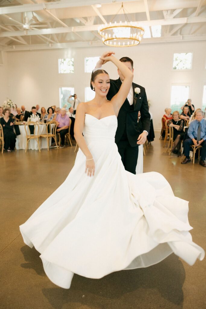 cute picture of the newlyweds dancing